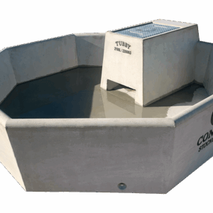 Octagonal concrete water trough filled with water, featuring a raised central platform with an engraved label "TUBBY 2100 LITRES." The side is marked with "CONRON STOCKCRETE.